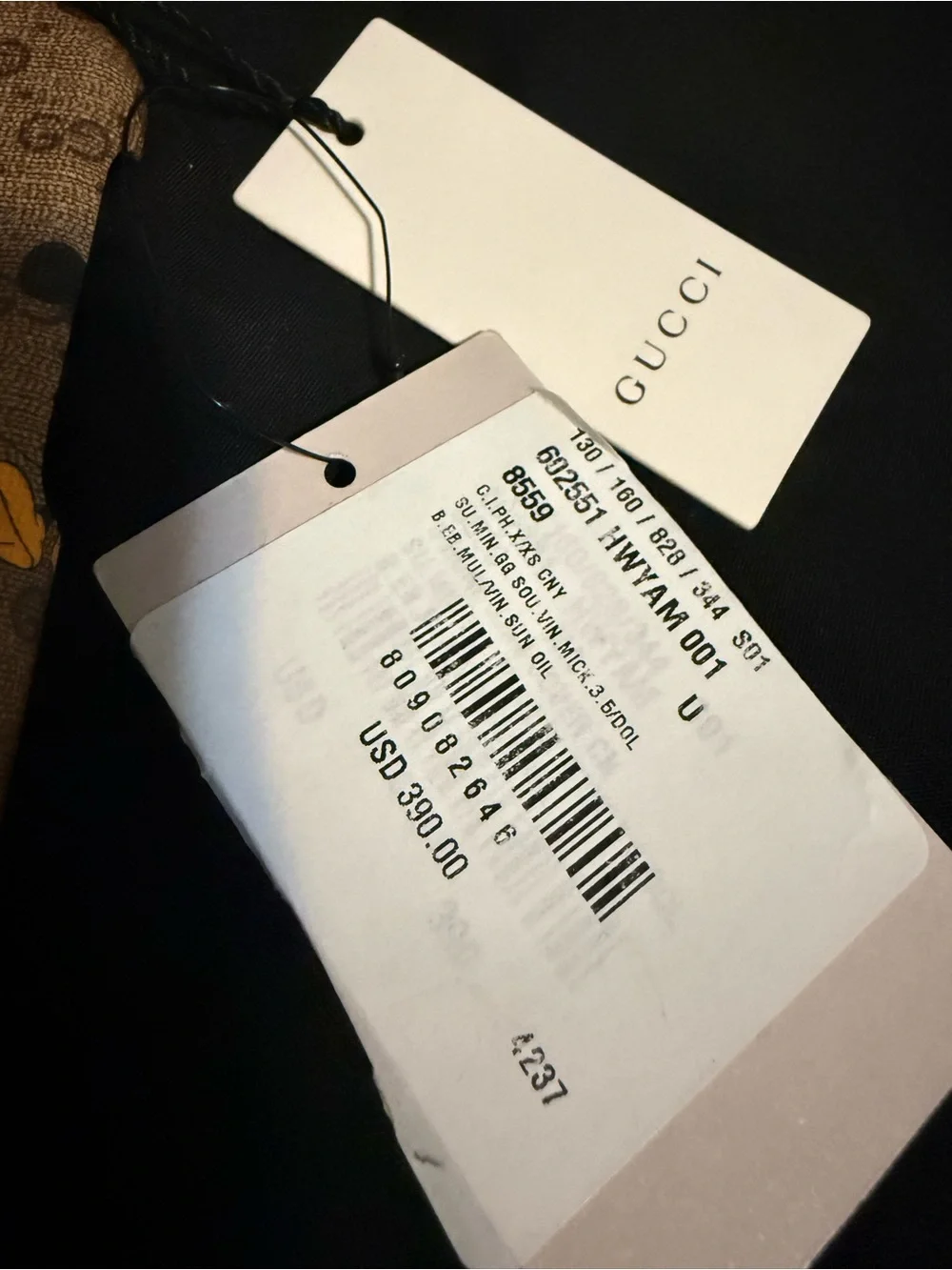 Gucci Brown GG Mickey Mouse Canvas iPhone Case with Tan Leather Patch.